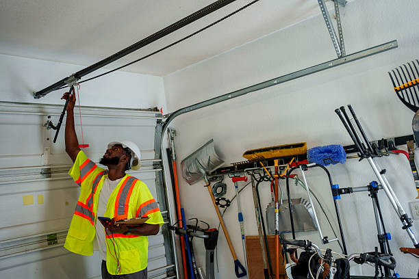 Professional Garage Door Roller Replacement technician working in Schwenksville, PA